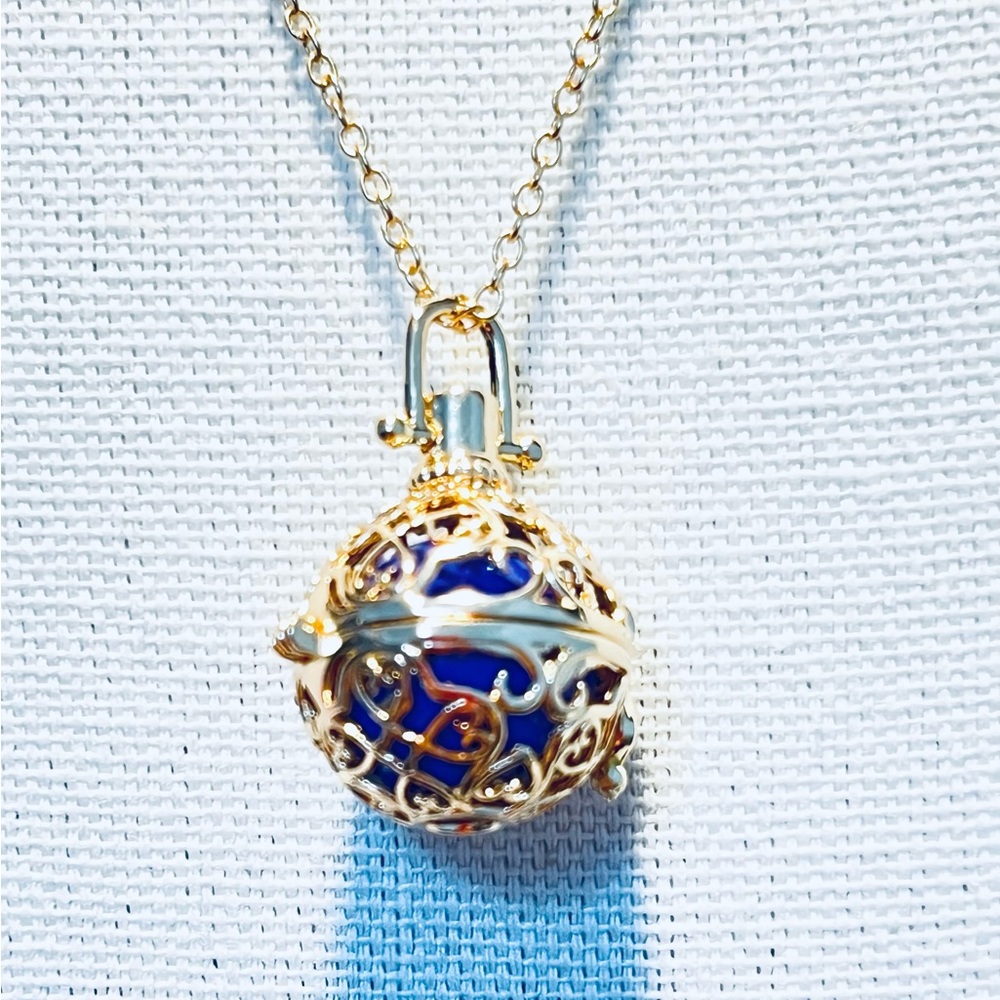New. Angel Chime necklace. 23” chain